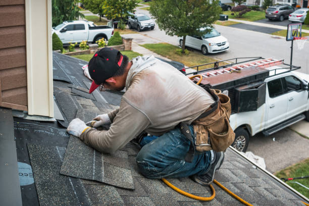 Professional Emergency Roof Repair technician working in Mount Olive, IL
